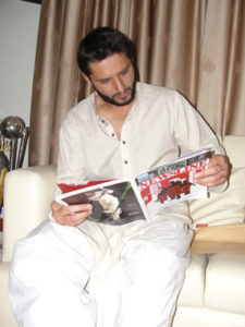 Newsline cover price: Rs100. A photo of Afridi intently reading the magazine: priceless. Photo: Saif Karamali