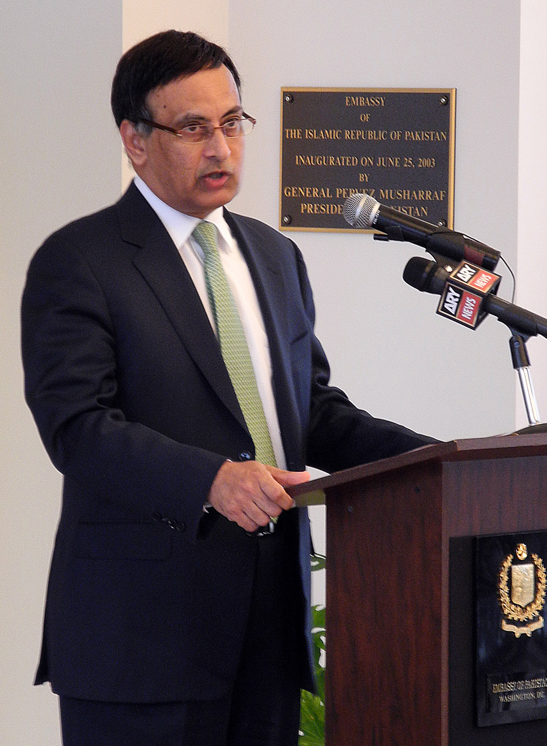 (FILES) This file photo taken on March 9, 2011 shows Pakistan's ambassador to the United States, Hussain Haqqani, addressing a memorial service in honor of slain minister for minorities Shahbaz Bhatti at the embassy in Washington. The White House said on November 22, 2011 that the resignation of Haqqani, was an "internal issue" for Pakistan but praised him as "a very close partner." Pakistan's government said earlier that it had asked Haqqani to resign and ordered a probe into claims that he sought American help against the country's powerful military. AFP PHOTO / FILES / SHAUN TANDON
