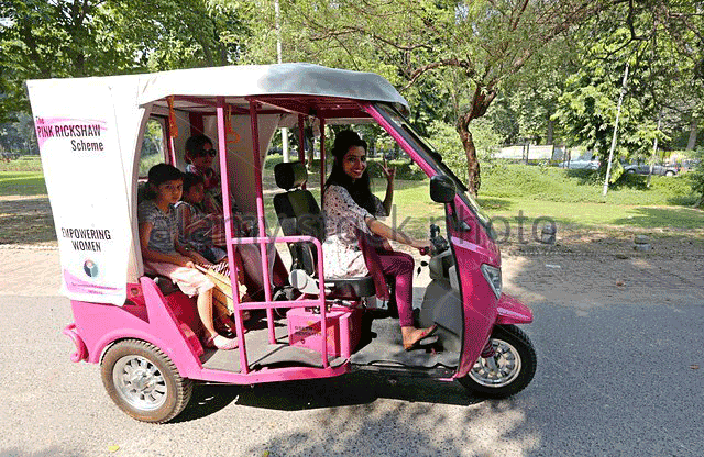 epa04971766-a-woman-steers-a-vehicle-of-the-pink-rickshaw-initiative-f3ww7a
