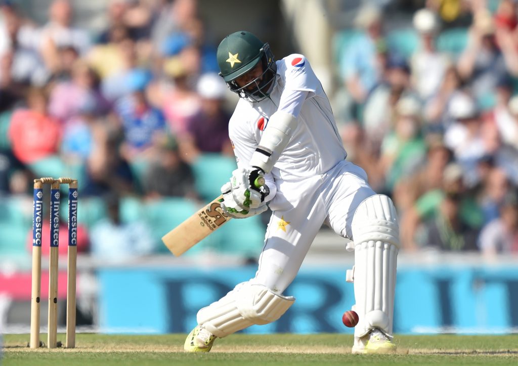 Pakistan's Azhar Ali hits a six, the winning runs during play on the fourth day of the fourth test cricket match between England and Pakistan at the Oval in London on August 14, 2016. Yasir Shah took five wickets as Pakistan marked the country's Independence Day with a 10-wicket win over England in the fourth Test at The Oval on Sunday. Victory saw Pakistan end the four-match series all square at 2-2 on an Oval ground where they won their first Test match in England back in 1954. / AFP PHOTO / OLLY GREENWOOD / RESTRICTED TO EDITORIAL USE. NO ASSOCIATION WITH DIRECT COMPETITOR OF SPONSOR, PARTNER, OR SUPPLIER OF THE ECB