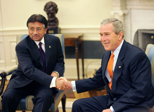 Musharraf with Bush: Bending over backwards.