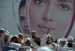 Say "Yes" to a Blanket Ban: According to one online poll, 68% of Pakistanis wanted the ban to be permanent. Photo: AFP