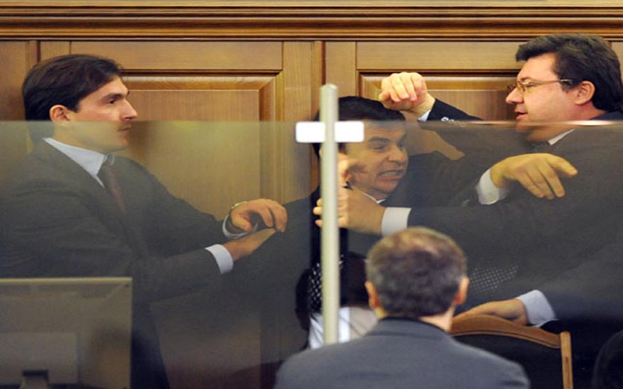 A new Orange Revolution? Throwing punches in the Ukraine parliament. Photo: AFP