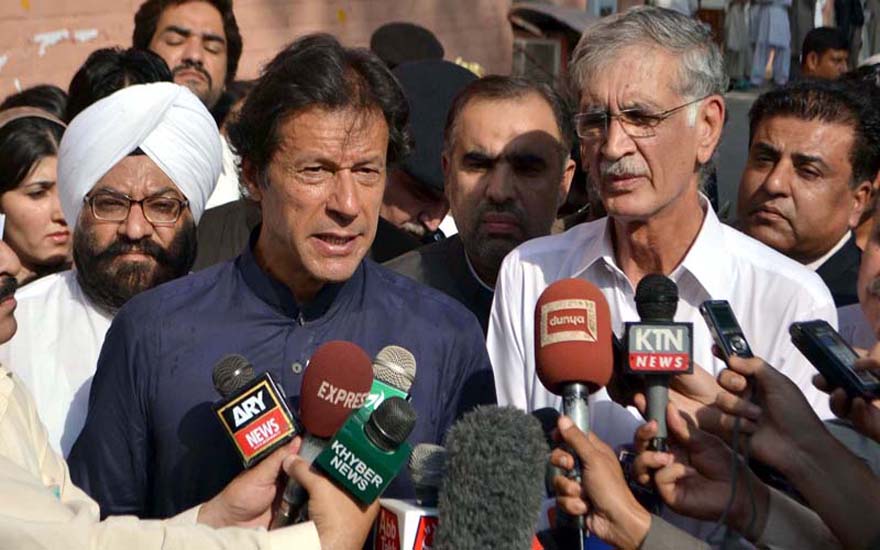 PESHAWAR, PAKISTAN, SEP 25: Tehreek-e-Insaf Chairman, Imran Khan talks to media persons during his visit to inquire after the health of Kohati Gate Church bomb blast victims at Lady Reading Hospital in Peshawar on Wednesday, September 25, 2013. (Fahad Pervez/PPI Images).
