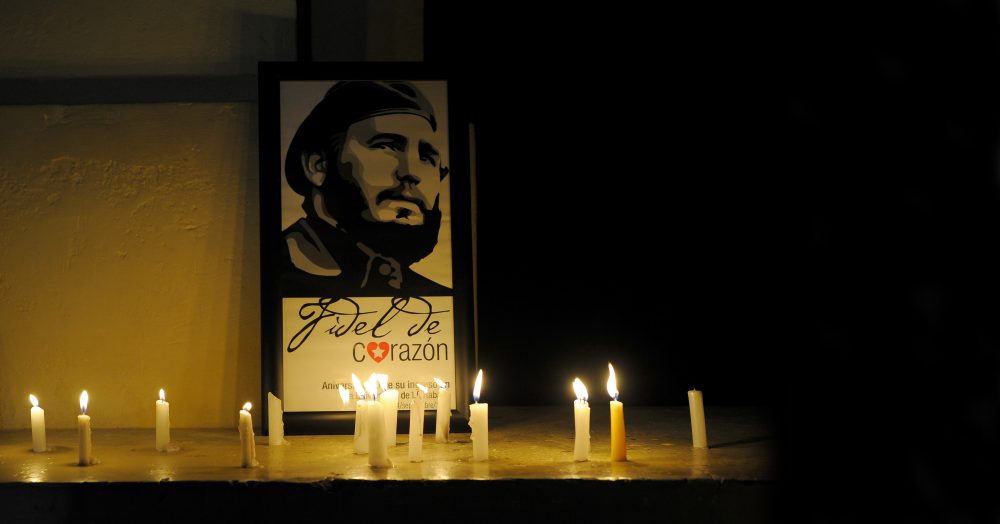 Students light candles in honour of Cuban historic revolutionary leader Fidel Castro a day after his death, 